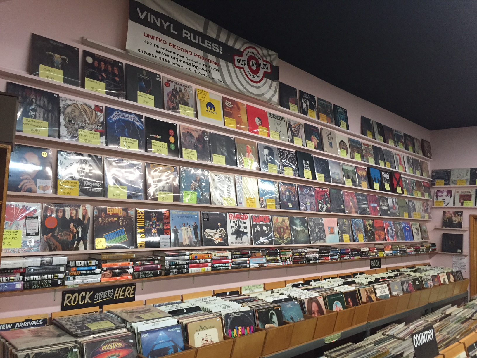 Wall of records and music shelves inside Phonoluxe